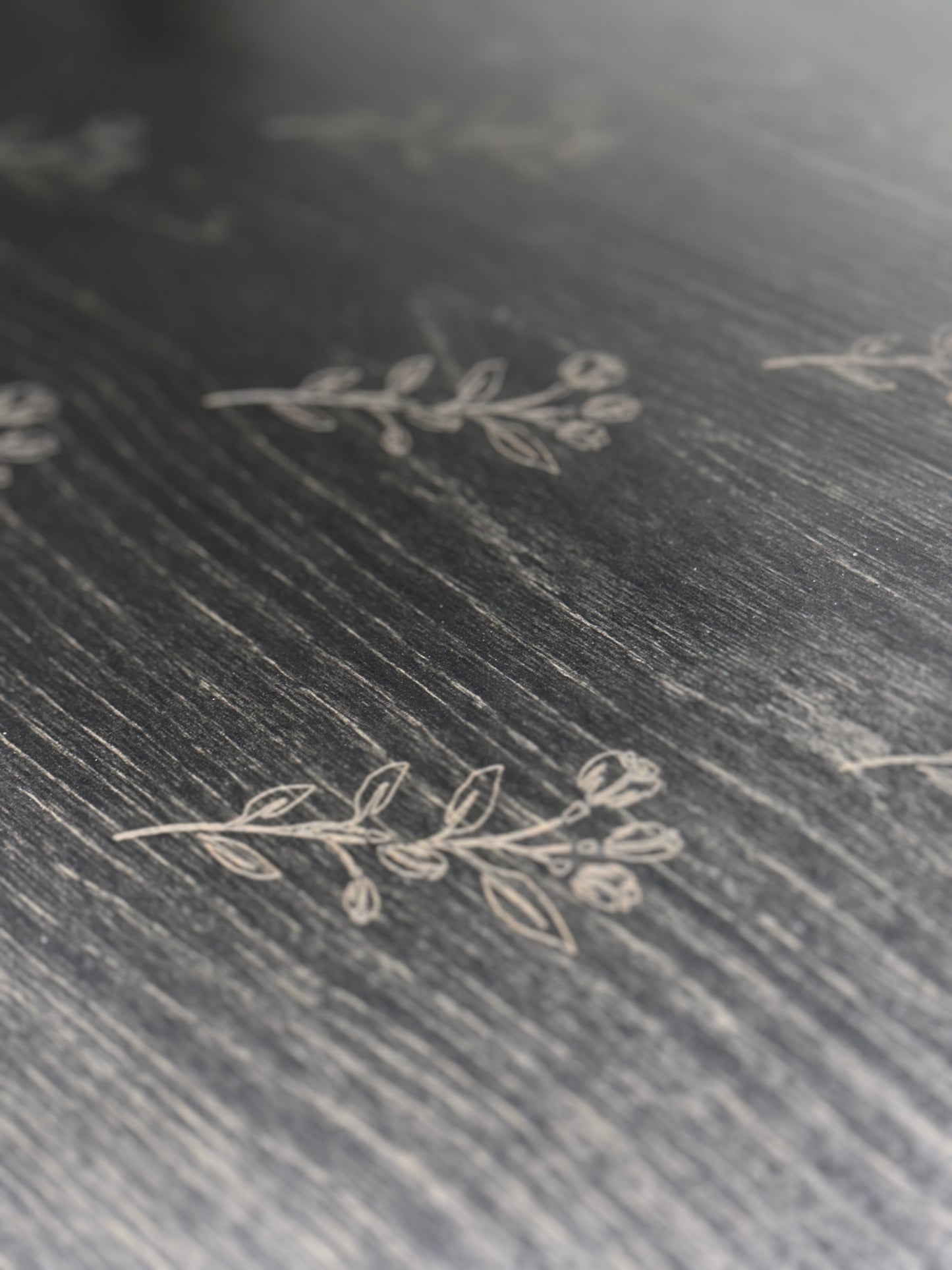 All over subtle floral design in black