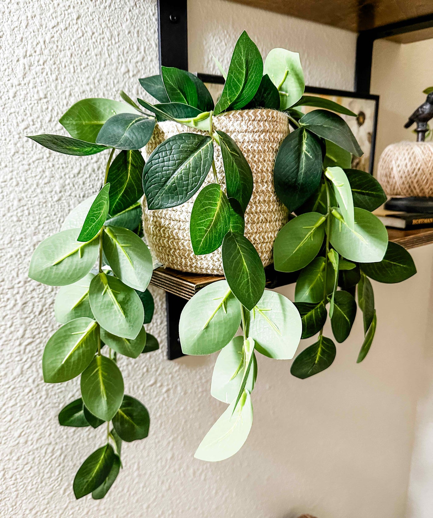 Faux greenery in basket