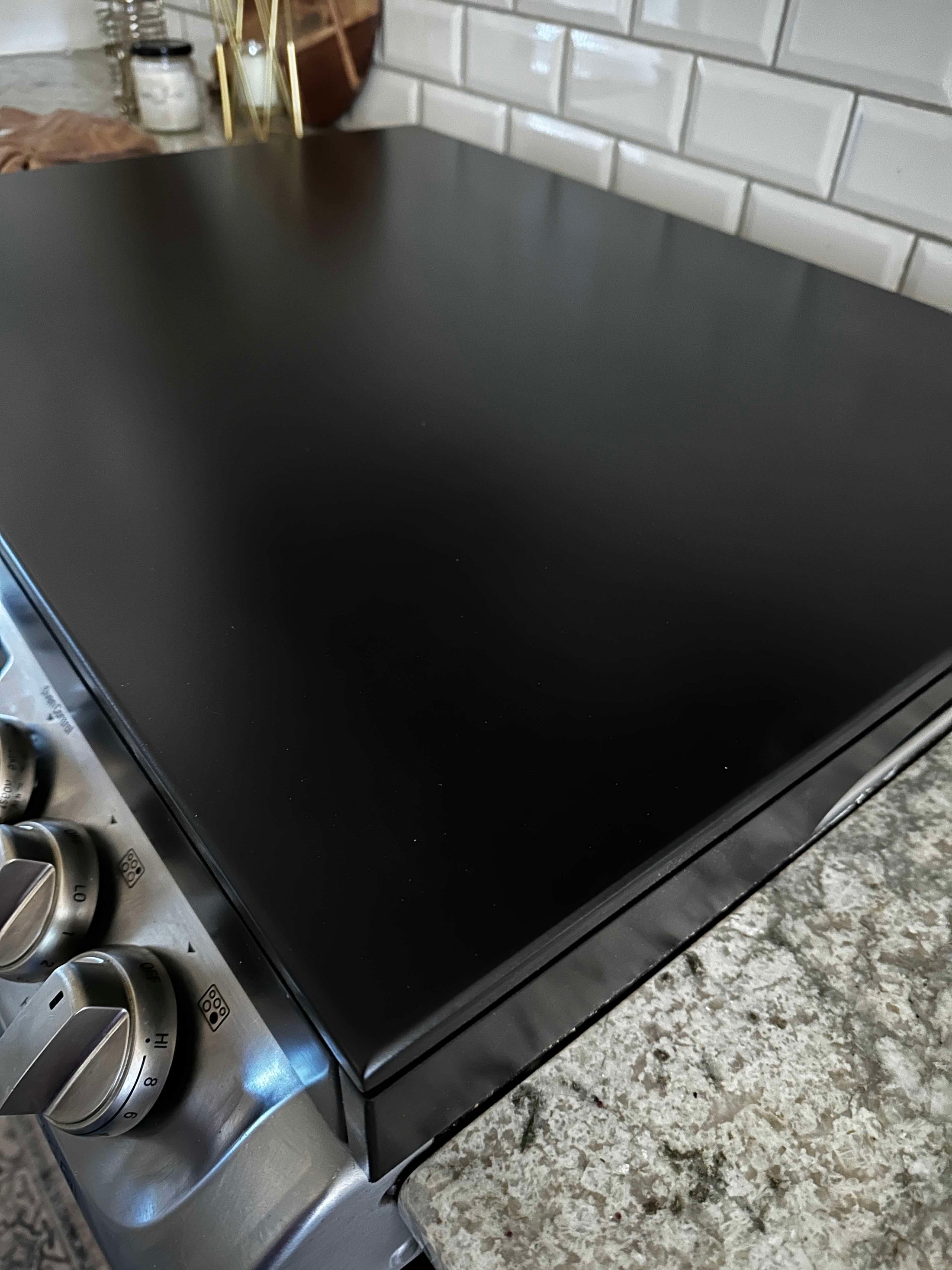 Clean and Simple Minimalist Black Stove Cover Josephine Thomas Home