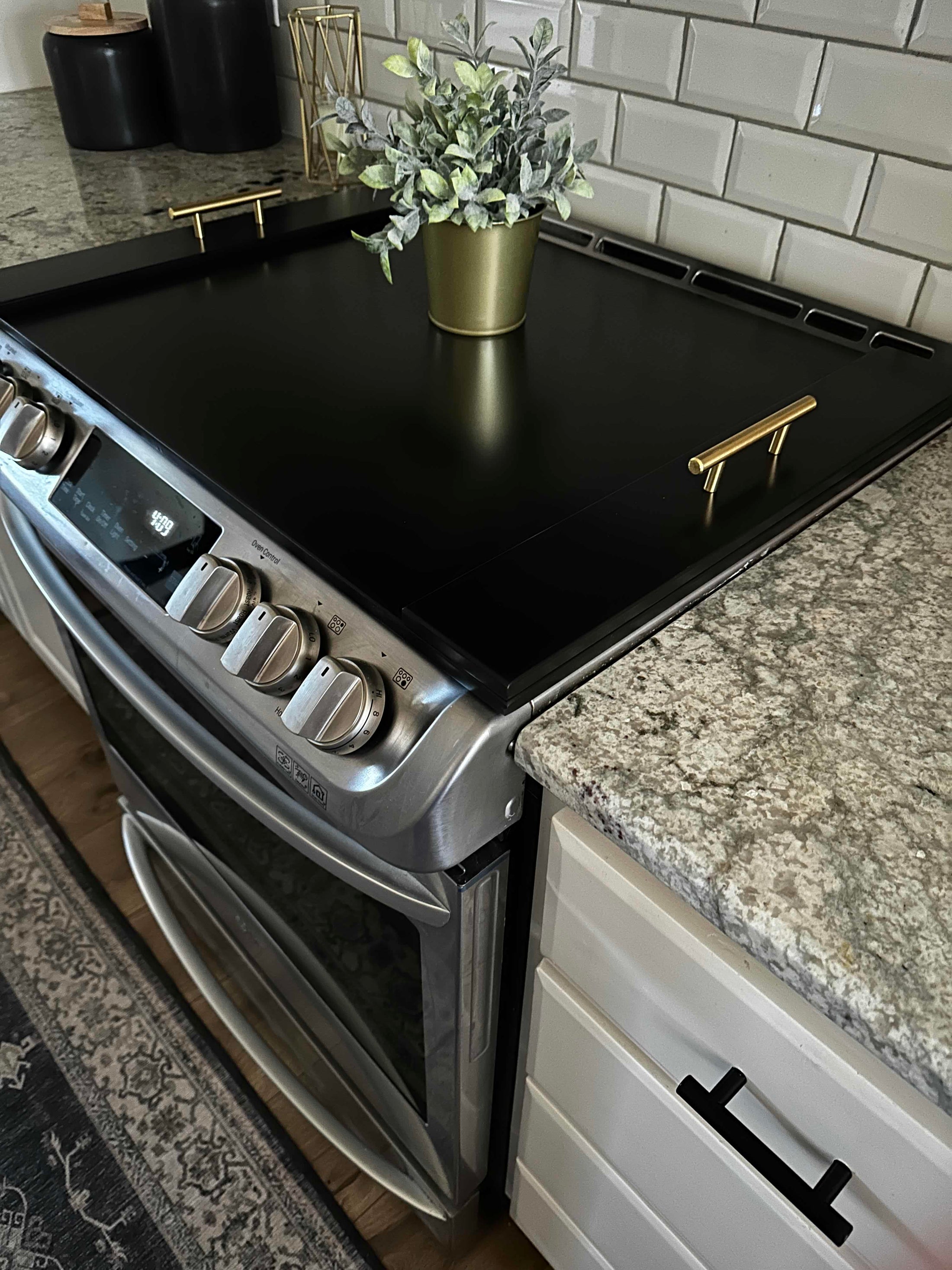 Clean and Simple Minimalist Black Stove Cover Josephine Thomas Home