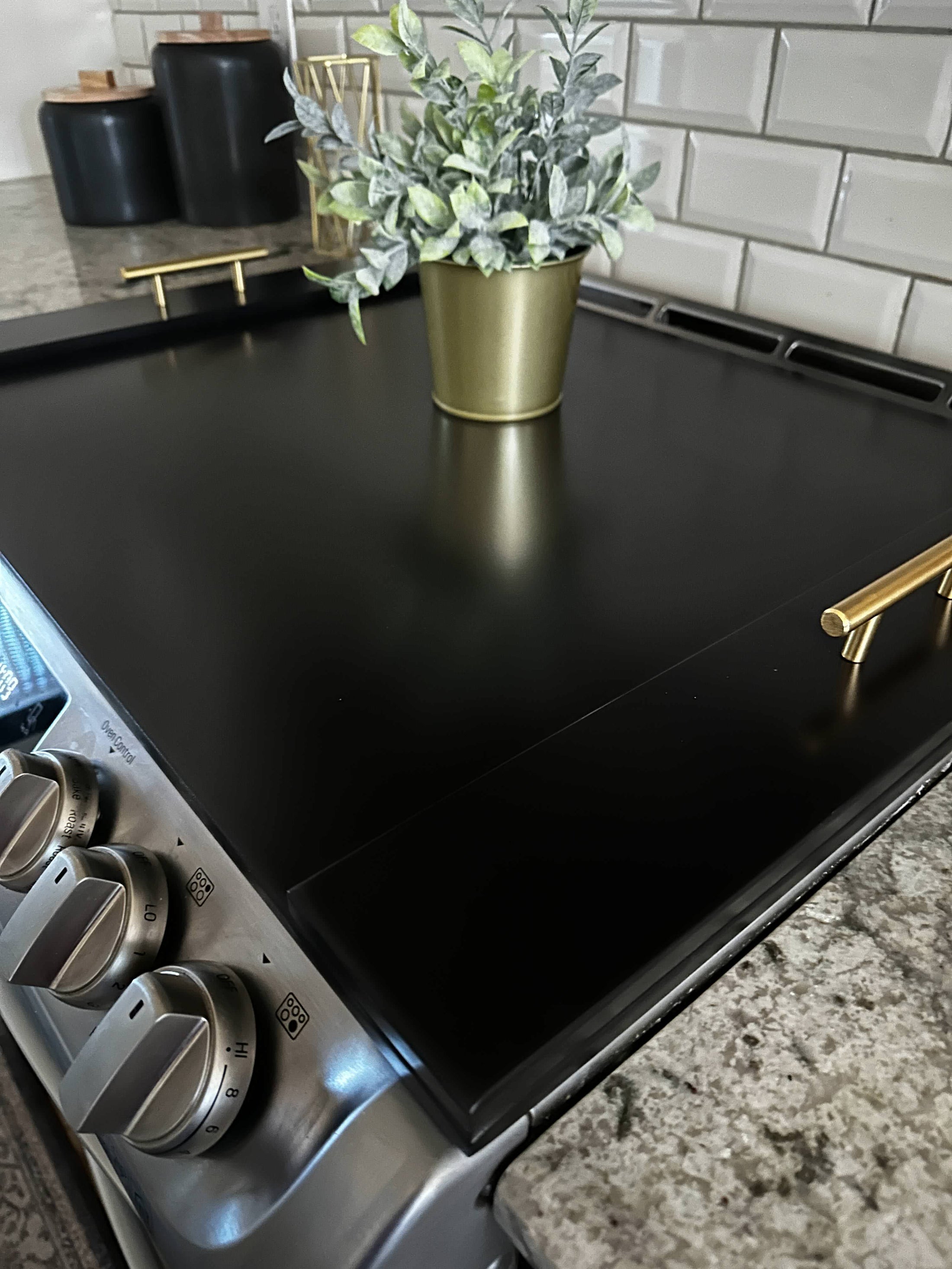 Clean and Simple Minimalist Black Stove Cover Josephine Thomas Home